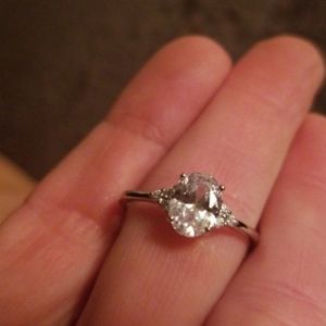 Oval party ring with 2 diamond accents